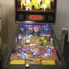 family guy pinball machine in a room