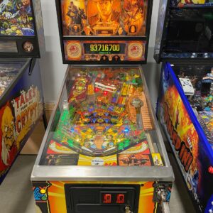 indiana jones pinball in a game room