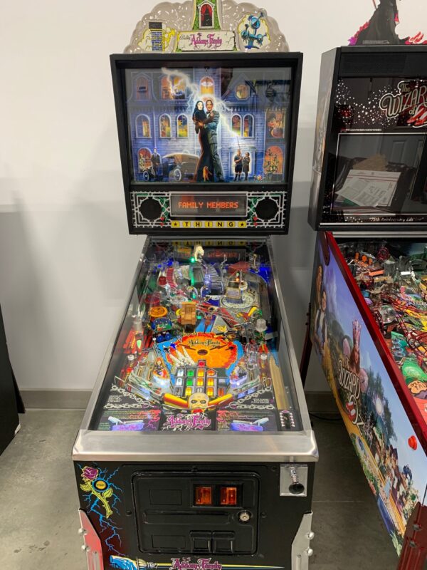 Addams Family Pinball in a room
