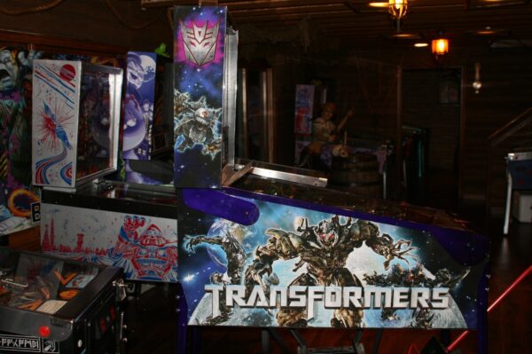 transformer pro pinball machine in a game room