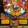 family guy pinball machine in a room