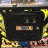 family guy pinball machine in a room